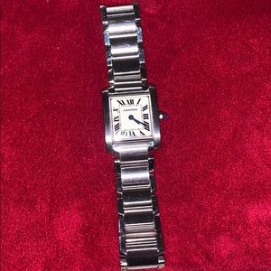 Women’s Cartier tank watch